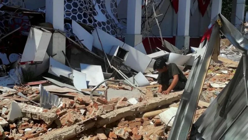 Powerful earthquake damages buildings in Indonesia, triggers tsunami waves