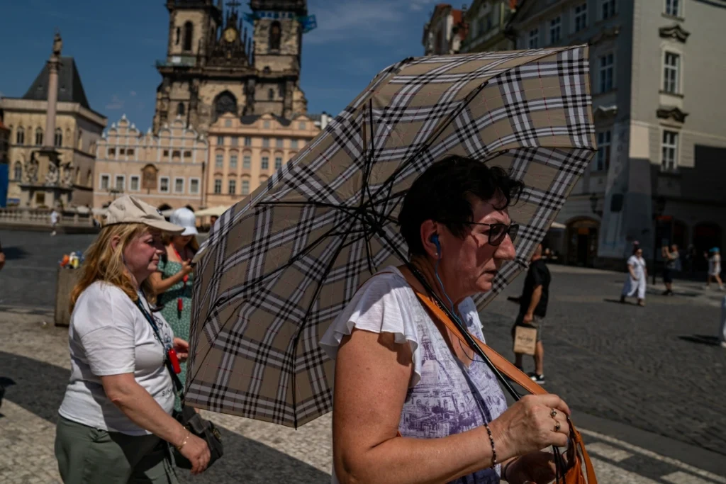 Record heat spreads across Europe, straining hospitals and transport